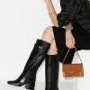 Fendi logo-plaque crocodile-embossed knee-high boots