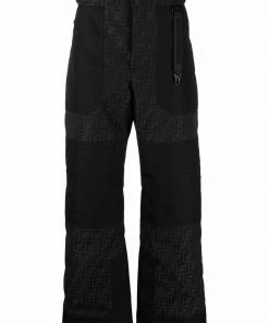 Fendi monogram-print panelled trousers